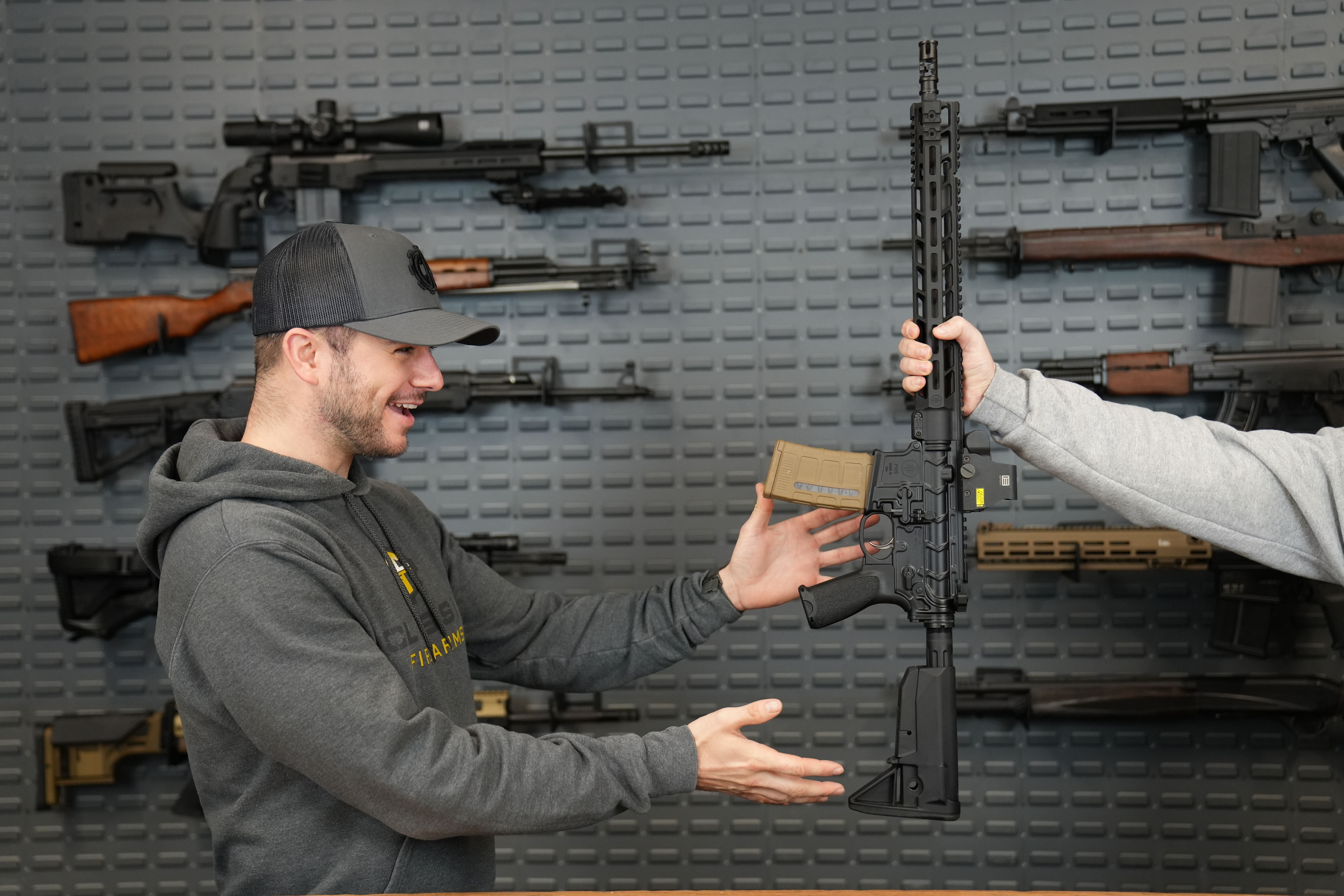 Clint receiving his gun from the FFL after purchasing online